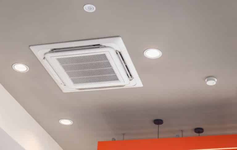 modern ceiling mount air conditioning unit in a commercial setting - gladstone air conditioning